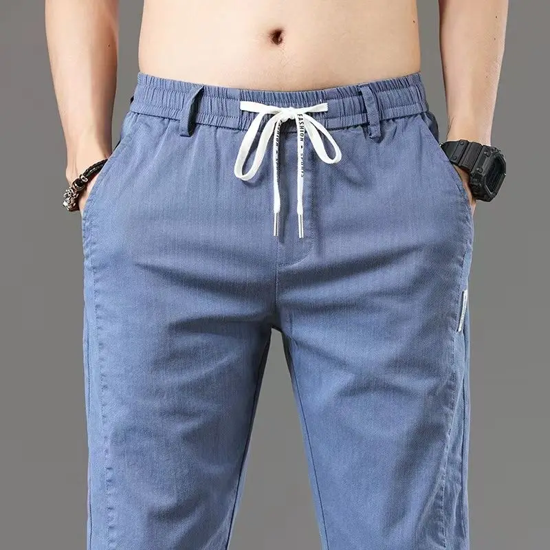 Ежедневни панталони мъжки летни маркови универсални тънки панталони директно намаляване на мъжки еластични спортни панталони 2023 градинска облекло панталон cargo
